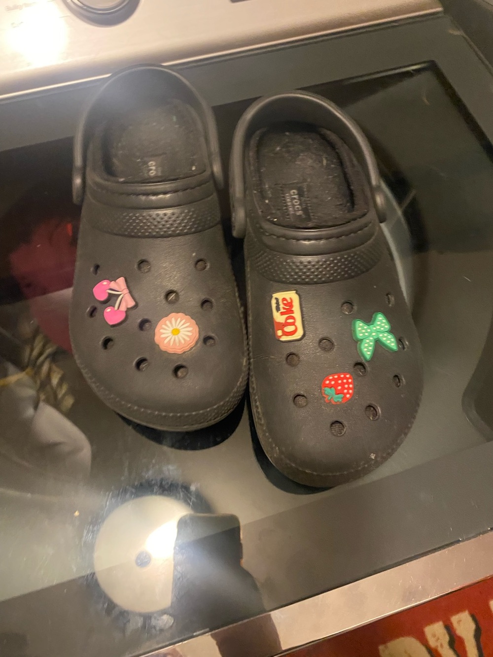 CROCS Black Kids Slip-On Clogs with Colorful Charm Accents